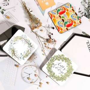 . Elegante juego de posavasos de madera hechos a mano con detalles pulidos y suaves, perfectos para la decoración moderna del hogar. - Product Image 4