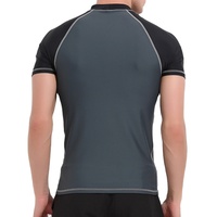 Camiseta de Compresión Negra para Hombre, Cuello Redondo, Manga Larga, Costuras en Contraste Azules, Protección Solar UPF50+, Diseño Personalizable
