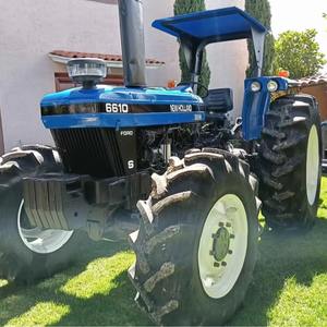 Fairly New Hollands 4WD Tractor agrícola Agrícola Alto rendimiento Calidad Premium Rueda Tractor Caja de cambios de motor de engranaje rápido - Product Image 1