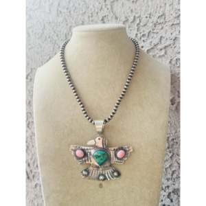Pendentif Thunderbird fait main en pierres multiples et or rose, avec serti en turquoise, en argent sterling, motif numéroté - Product Image 1