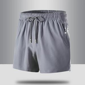 Pantalones cortos informales de lana de hielo caliente para hombres Gimnasio Deportes Playa Correr Suelto Ligero Transpirable Ecológico Secado rápido Color sólido - Product Image 2