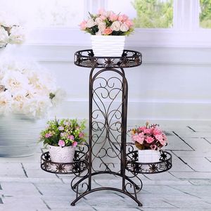 Soporte de maceta de metal hecho a mano de primera calidad con construcción duradera y detalles elegantes para la decoración del hogar y el jardín - Product Image 2