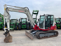 Mini-excavatrice sur chenilles Takeuchi TB290-2, cabine blanche et rouge, chenilles, moteur diesel 24 CV, godet de 0,12 m, TB230 TB135