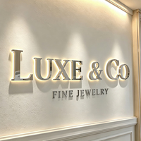 Lettres en relief personnalisées LC, logo en métal rétroéclairé par LED, enseigne commerciale illuminée personnalisée pour la réception d'un magasin de bijouterie fine