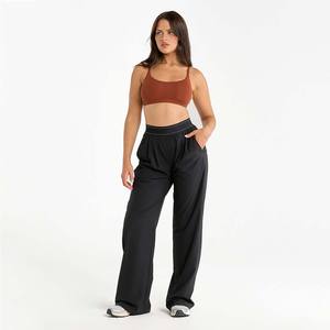 Conjuntos de mujer OEM marrón personalizados de alta demanda, conjunto de 2 piezas, pantalones de flujo elemental para mujer y Bralette, conjunto de Yoga de cintura alta elástico suave - Product Image 1