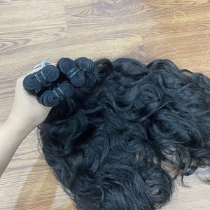 Extensiones de cabello ondulado natural de tendencia caliente Cabello humano vietnamita sin procesar de alta calidad Sin desprendimiento Sin enredos - Product Image 4