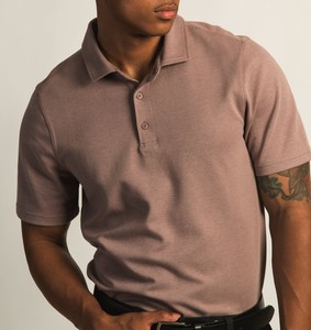 Polo de alta calidad estilo 2025 tela de algodón suave disponible al por mayor bordado de logotipo personalizado - Product Image 1