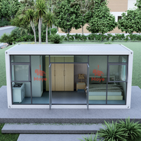Maison moderne préfabriquée de 20 pieds 40 pieds Appartement modulaire d'une pièce Pack plat Maison de conteneur de café à faible coût pour hôtel
