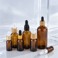 Bouteilles compte-gouttes en verre ambré de 5 ml à 120 ml en gros, emballage personnalisé résistant aux UV pour huiles essentielles et sérums avec plusieurs couvercles
