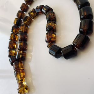 Misbaha en ambre vert de la Baltique, perles naturelles en forme de baril avec des inclusions végétales - Product Image 3