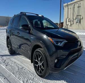 NUEVO MODELO 2018 Toyota RAV4 Híbrido SE A.W.D. Interior en Cuero Oscuro, Llantas de Aleación de 17 Pulgadas, Cámara Trasera, Usado - Product Image 1