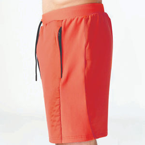 Pantalones cortos flexibles acanalados de tela de rendimiento ligero naranja con cintura de tela acanalada y dobladillo con puños - Product Image 4