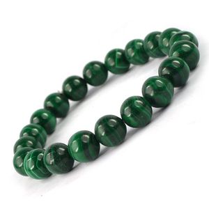 Bracelet en perles rondes de malachite naturelle de 10 mm - Guérison par les cristaux pour la protection, la transformation et l'énergie positive - Product Image 1