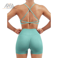 Nouvel Arrivage Ensemble de Sport pour Femme : Short Taille Moyenne et Soutien-Gorge de Sport Uni Élégant |   Ensemble respirant et écologique en Spandex/Nylon