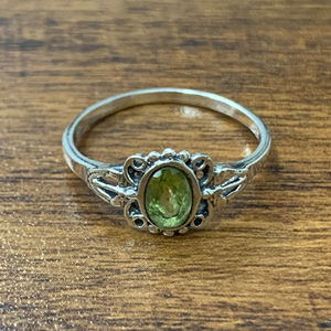 1.7 Grams <b>Peridot</b> <b>Ring</b> in Yellow Gold Oval Cut Natural Stone Gemstone Rhodium Plated with Elegant Setting for Everyday Wear - Product Image 1