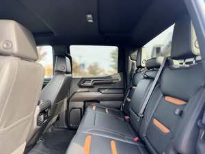 Super Blue 2024 GMC Sierra 1500 AT4 Crew Cab 4WD Techo Panorámico Arranque Remoto Asientos de Cuero Paquete Premium Cromado Izquierdo Oscuro - Product Image 6