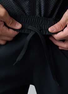 Jogger ajustado de alta calidad para hombre, material ligero y transpirable, bolsillo elástico en la cintura con cremalleras y detalle de cremallera en la espalda - Product Image 5