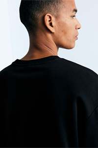 Noir chiné Bland manches longues côtelé sweat T-Shirt support épaule tombante coupe ample veste d'hiver en coton Polyester - Product Image 3