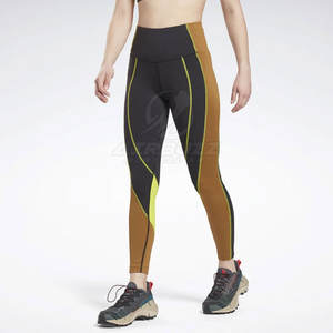 Medias de compresión deportivas de cintura media de alta calidad Leggings de yoga sin costuras con patrón sólido - Product Image 1