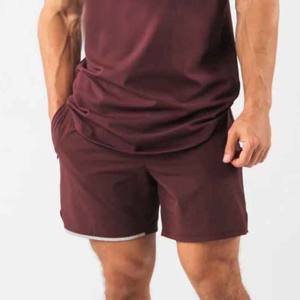 กางเกงขาสั้นออกกำลังกายสำหรับผู้ชายเอวยางยืดสวมใส่สบายแห้งเร็ว - Product Image 1