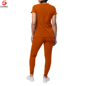 Ensemble de gommage pour femmes Top avec col en V et pantalon avec taille élastique complète et ourlet à fentes latérales Meilleur fournisseur - Product Image 2