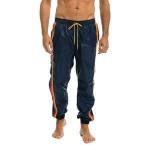 Pantalones cortavientos de nailon ligeros, transpirables, de pierna recta, de secado rápido, holgados, ropa de calle, decoración con botones - Product Image 1