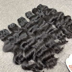 Venta al por mayor de extensiones de cabello humano Remy virgen 100% de alta calidad, ondulado, doble trama, cabello crudo de Vietnam, color 1B, sin químicos. - Product Image 5
