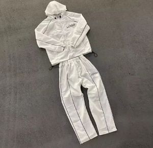 Survêtement en nylon à fermeture éclair avec logo personnalisé, survêtement de jogging de haute qualité en deux pièces, coupe-vent en polyester pour hommes - Product Image 1