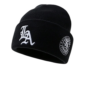 Gorros de punto elásticos personalizados OEM con diseño de calavera jacquard, tejido de algodón, ribete acanalado, logotipo personalizado y lazos de puntos. - Product Image 1