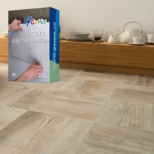 Adhésif pour carrelage flexible C2TES1 gris blanc résistant aux intempéries à base de ciment pour carrelage de grande taille, murs et sols - Product Image 1