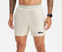 Shorts de sport pour hommes, coupe courte, tissu uni écologique léger à séchage rapide, anti-plis, taille élastique, maille respirante