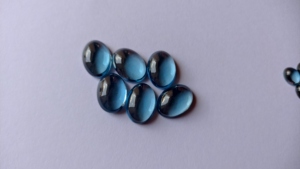 Fine Qualité Naturel Londres Bleu Topaze Ovale 7X9mm Cabochon Lâche Dos Plat Bleu Topaze Facette Gemme En Gros Lot Pour Bijoux - Product Image 6
