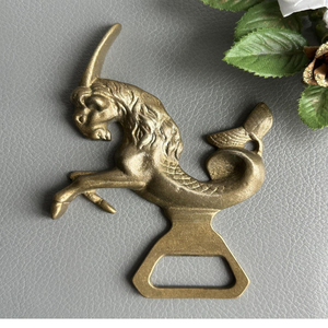 Ouvre-bouteille éléphant en laiton orné, une pièce décorative et culturelle avec des sculptures complexes. - Product Image 3