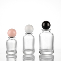 Nouveau flacon de parfum cylindrique en verre 50ml 100ml à fond épais avec sérigraphie, pulvérisateur transparent avec couvercle Wx-47