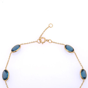 Meilleure vente Bracelet réglable en or jaune massif 18 carats Topaze bleue naturelle Pierre précieuse ovale Bijoux fins à la mode pour les cadeaux de fêtes - Product Image 3