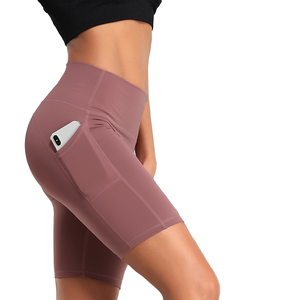 Vente chaude femmes Yoga Shorts taille haute poches diagonales séchage rapide maille respirant solide motif entraînement Gym sport Shorts - Product Image 4
