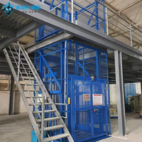 Ascenseur de fret hydraulique sur mesure, plateforme de levage de marchandises industrielle robuste pour entrepôt vertical