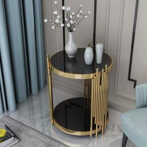 Fourniture en gros d'une élégante table basse en acier inoxydable avec dessus en verre pour une décoration intérieure polyvalente disponible au meilleur prix - Product Image 1