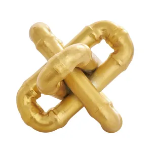 Escultura geométrica Jack de eslabones de cadena de Metal dorado con crestas dimensionales o escultura pulida moderna geométrica de Metal Deco - Product Image 1