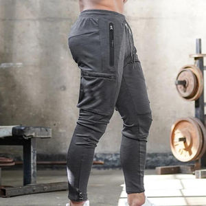 Pantalones de chándal deportivos ligeros informales transpirables oscuros con múltiples bolsillos para hombre de alta calidad OEM pantalones Cargo de nuevo diseño personalizados - Product Image 1