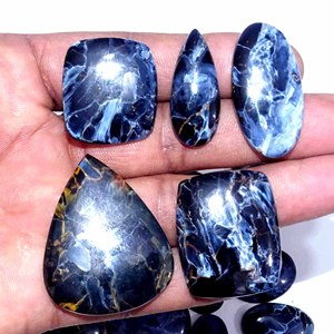 พลอยพีเทอร์ไซต์สีน้ำเงินธรรมชาติ พลอยพีเทอร์ไซต์ทรงหลังเบี้ยสีน้ำเงินสวยงาม พลอยพีเทอร์ไซต์ทรงหลังเบี้ยสำหรับทำเครื่องประดับ - Product Image 2