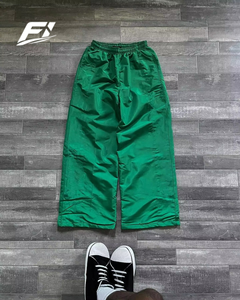 Pantalones deportivos casuales de nailon de peso medio personalizados, de pierna ancha, holgados, de secado rápido, transpirables, con estampado por transferencia térmica, para hombre, al por mayor - Product Image 5