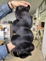 Meilleurs paquets de cheveux cambodgiens ondulés, cheveux épais non cassés, sans enchevêtrement et sans perte Vendeur de cheveux vierges bruts