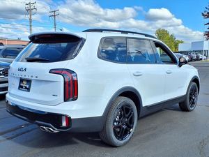 Kia Telluride SX-Prestige X-Line AWD 2025 Usada Blanca con Techo Panorámico, Arranque Remoto, Asientos de Cuero y Tercera Fila de Asientos - Product Image 5