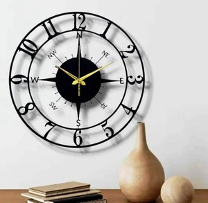 Modern Black Metal Round Wall Clock Minimalist Style Eye Catching Design Perfect For Contemporary Interiors And Decor - Product Image 1