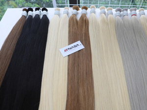 ผมต่อเวียดนามแท้ 100 กรัม สีอ่อน ทุกขนาด เย็บด้วยเครื่องจักรแบบ Double Weft  ซุปเปอร์ดับเบิ้ลดรอน  แบบถักเป็นมัด - Product Image 2