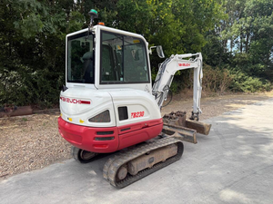 Superbe mini-excavatrice sur chenilles Takeuchi TB2150R, pompe hydraulique, moment de charge élevé, fonctionnement silencieux, cabine, moteur, système de pré-nettoyage 4 - Product Image 1