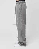 2025 hommes lavage à l'acide 100% coton tricoté Baggy pantalons de survêtement Logo personnalisé haute mi-taille coupe ample poids lourd jambe large polaire dentelle