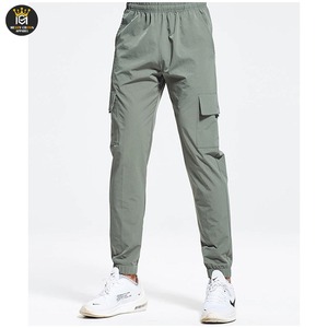 Pantalon cargo multi-poches respirant pour homme, style streetwear tendance, avec cordon de serrage, détail bouton, style hip-hop décontracté - Product Image 1