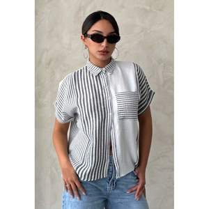 เสื้อเชิ้ตและเสื้อเบลาส์ลายทางสีดำสำหรับผู้หญิงขายส่ง Topshow - Product Image 5